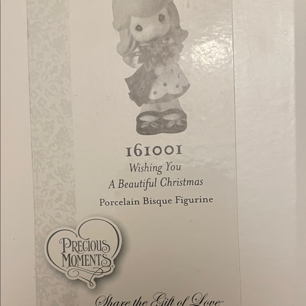 Precious Moments Porcelain Figurine with Blue and White Details